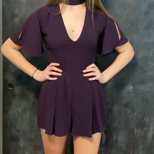 Size small dark purple romper